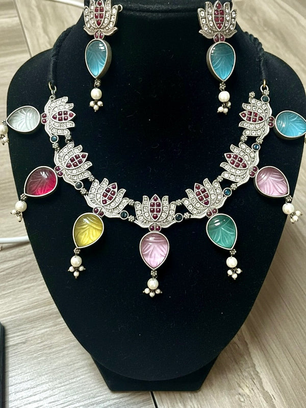 Silver-Plated Lotus Statement Necklace Set with Multicolor Carved Drops | Festive Fusion Jewelry
