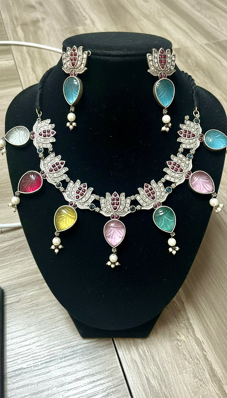 Silver-Plated Lotus Statement Necklace Set with Multicolor Carved Drops | Festive Fusion Jewelry